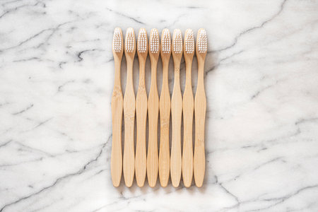 Close-up of toothbrushes on a white marbleの写真素材