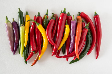 Close-up of different colored chilliesの写真素材