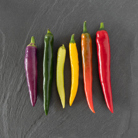 Close-up of different colored chilliesの写真素材