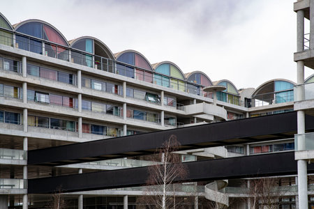 Apartment building with colored curtainsの写真素材