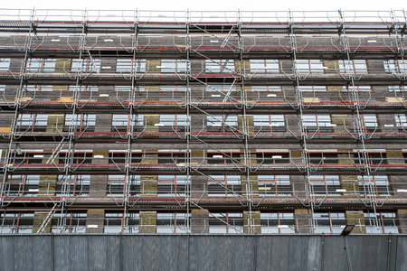 Thermal insulation of a building from the outside with scaffoldingの写真素材