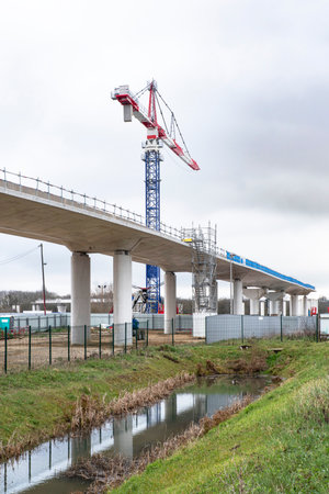 Concrete bridge under construction seen from belowの写真素材