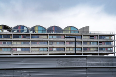 Apartment building with colored curtainsの写真素材