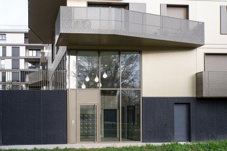 Facade of a modern apartment building with balconiesの写真素材