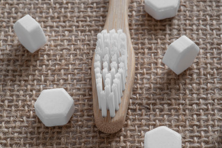 White solid toothpaste tablet with bamboo toothbrushの写真素材