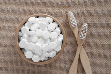 White solid toothpaste tablet with bamboo toothbrushの写真素材