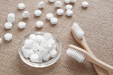 White solid toothpaste tablet with bamboo toothbrushの写真素材