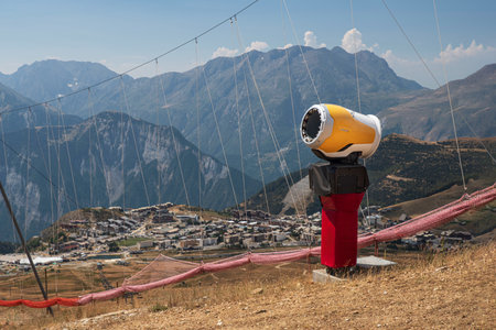 Artificial snow cannon in summer in the French Alpsの写真素材