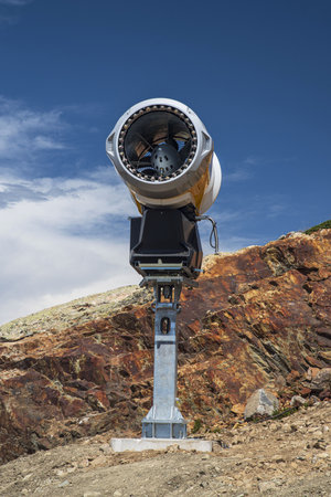 Artificial snow cannon in summer in the French Alpsの写真素材