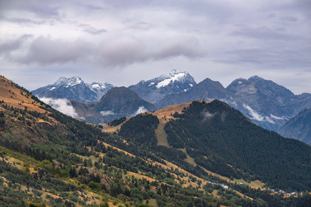 Mountain landscape in summer with the glaciers of the Ecris massif in the backgroundの写真素材