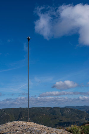 Lightning conductor at the top of a mountain buildingの写真素材
