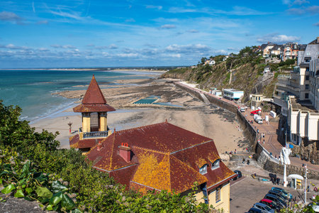 Landscape of the town of Granville in Normandy in France, with the beach, the coast, the sea and typical old housesの写真素材