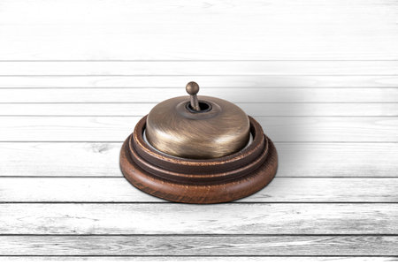 Close-up of a vintage electrical switch on a white wood backgroundの写真素材