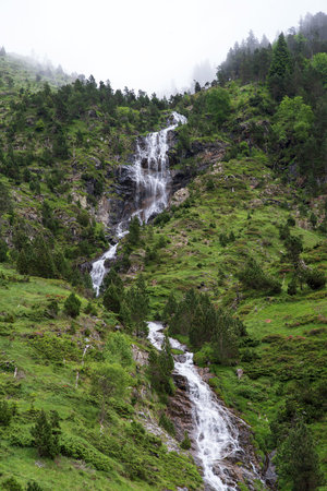 A mountain waterfall in the Pyrenees in Franceの写真素材