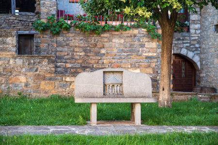 Sculpted stone bench in the town of Ainsa in Spain