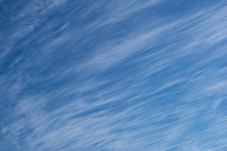 White clouds on a blue winter skyの写真素材