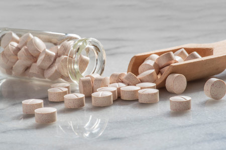 Close-up of medicines or food supplements to treat oneself or to illustrate medicine in a bottleの写真素材