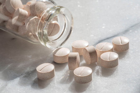 Close-up of medicines or supplements to treat oneself or to illustrate medicine in a bottleの写真素材