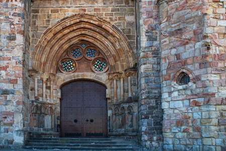 Entrance door to the church in the town of Castro Urdiales in Spainの写真素材