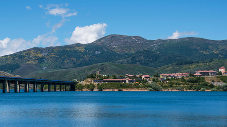 Town and mountain lake at Riano in Spain in the Picos de Europa Parkの写真素材