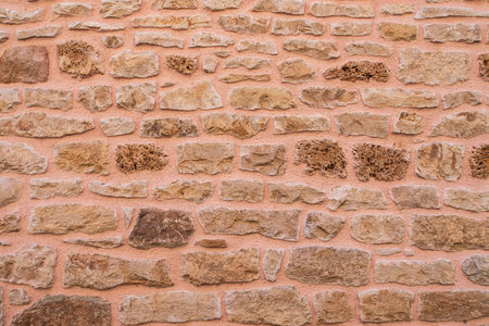 Texture of an old stone wall typical of the south of Franceの写真素材