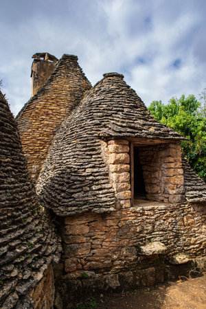 Cabane du Breuil, or bories, old small stone huts in the Dordogne region of Franceの写真素材