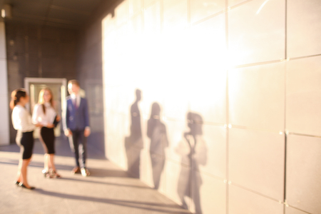 Photo of silhouettes of two girls elegant successful and handsome male man young office workers,...