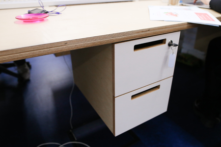 Simple computer light table for work, on which there are various devices and gadgets.の写真素材