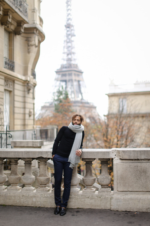 Attractive mix blood man walking and waiting for someoneの写真素材