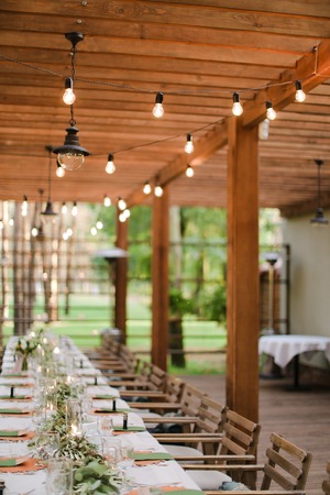 Decorated table for wedding party at restaurant. Concept of catering establishment.の写真素材