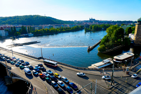 Traffic jam on bridge, Vltava river in Prague, Czech Republic. Concept of cars and road safety.のeditorial素材