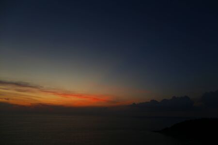 Calm sunrise on blue dark sky. Concept of evening skyscape.の写真素材