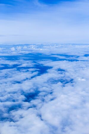 Clouds from airplane on blue sky. Concept of background photo of skycape.の写真素材