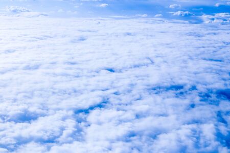 Amazing clouds from airplane on blue sky. Concept of background photo of skycape.の写真素材