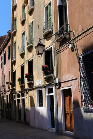 Old nice buildings in sun rays. Concept of town photos and european architectue.の写真素材