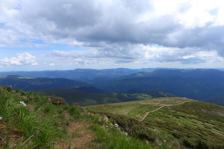 Wonderful Carpathian mountains and clouds in background. Concept of nature landscapes and summer season.の写真素材