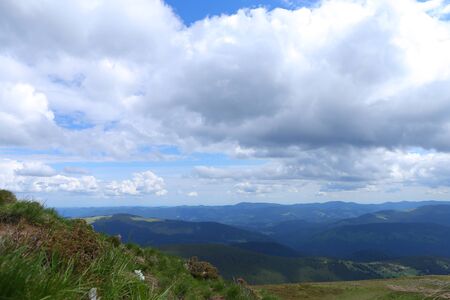 Amazing Carpathian mountains and clouds in background. Concept of nature landscapes and summer season.の写真素材