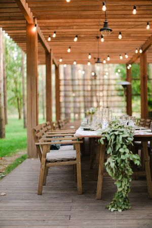 Decorated table for wedding banquet at restaurant. Concept of catering establishment.の写真素材