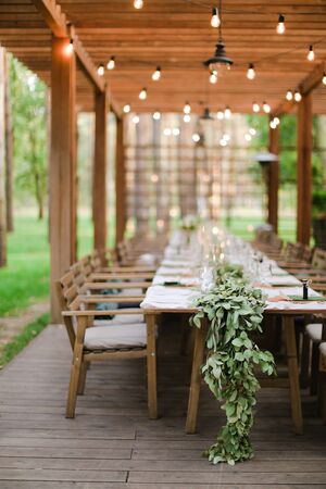 Decorated table for wedding birthday at restaurant. Concept of catering establishment.の写真素材