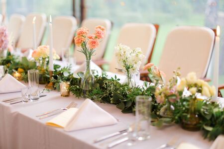 Decorated and served table for wedding. Concpt of bridal banquet.の写真素材