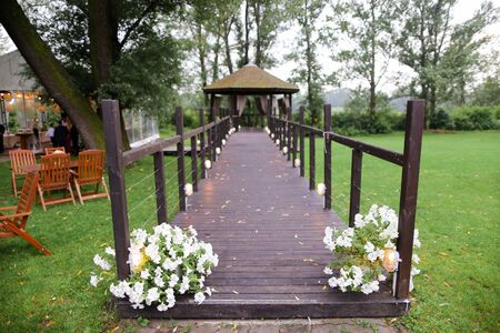 Alcove in garden and decorations for wedding. Concept of flowers and nature.の写真素材