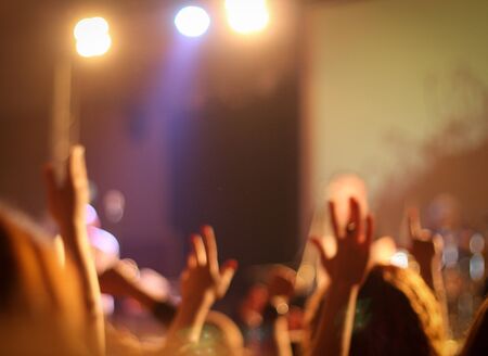 Raised hands on disco. Concept of party background photo.の写真素材