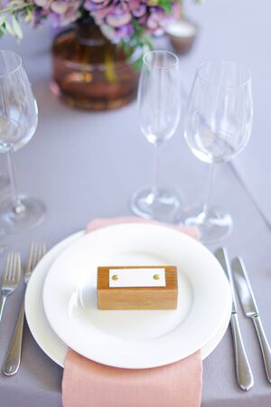 Closeup plate, fork and knife on served table. Concept of tableware and cafe.の写真素材