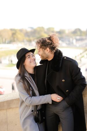 Afro american man hugging caucasian girl. Concept of love and international couple.の写真素材