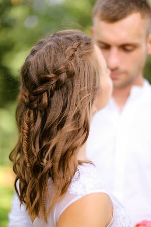 Happy groom with caucasian bride. Concept of married couple and love.の写真素材