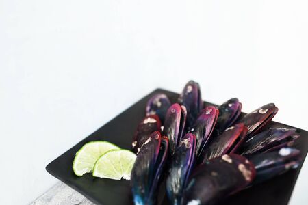 pink exotic Healthy mollusk food is tasty appetizer at luxurious restaurant, delicious mussel as traditional sea cuisine, pacific ocean dishの写真素材