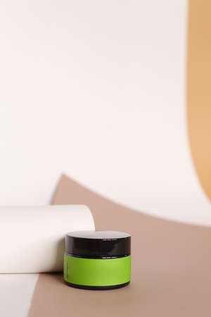 Focus on jar of facial cosmetic cream with green space for brand. Concept of cruelty free, organic, kosher cream is great for dry and rough skin.の写真素材