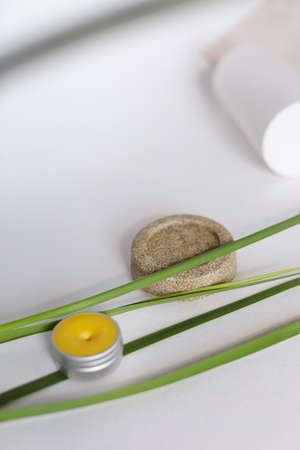 Solid soap or scrub and ecofrienldy yellow balm in jar on white background. Concept of organic cluelty free, kosher cosmetics and online shop.の写真素材