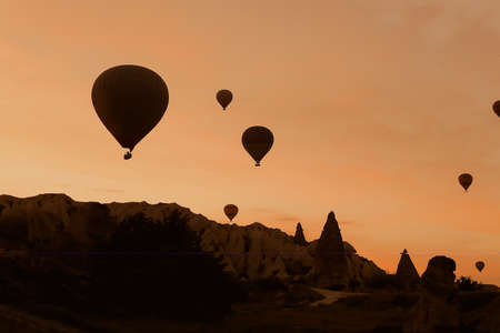 Hot air ballons flying over Cappadocia, Turkey.の写真素材