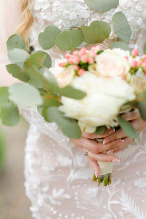 Closeup cute bride bouquet of roses.の写真素材